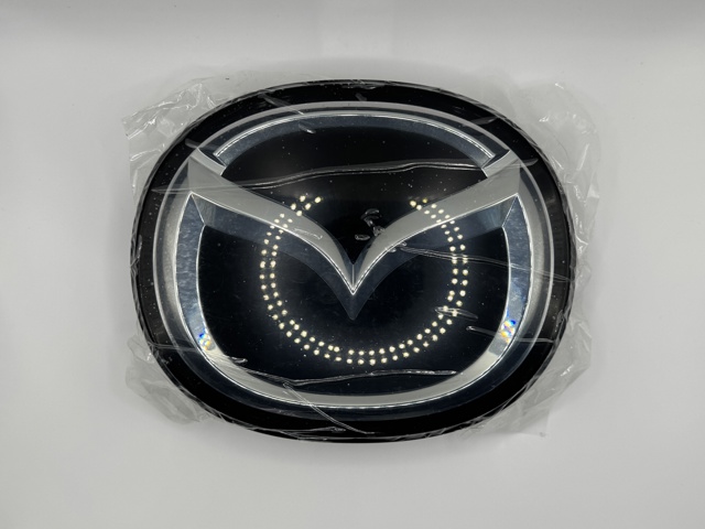 Фирменный значек решетки радиатора BCKB51730 MAZDA