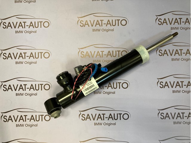 Амортизатор задней подвески, левый 37106875087 BMW