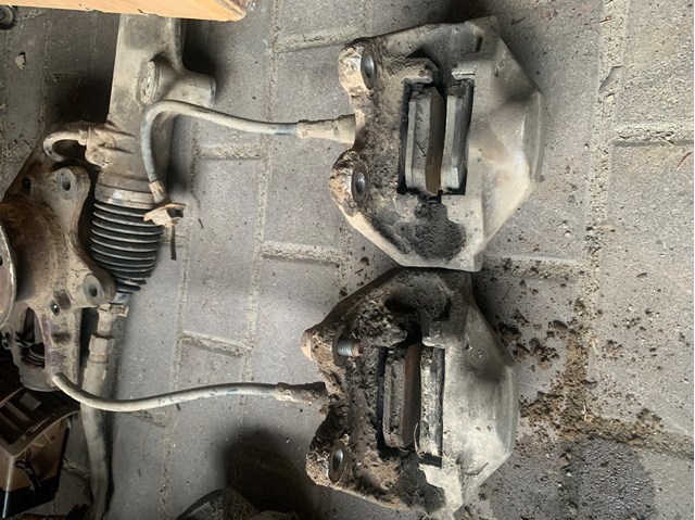 Тормозной суппорт задний левый A1634230098 MERCEDES