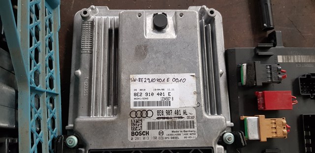 Электронный блок управления двигателем 03G906016JE VAG