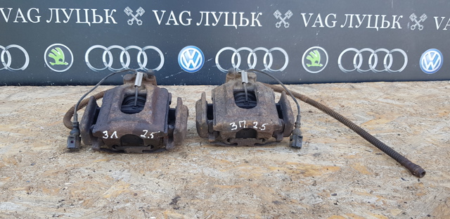 Суппорт тормозной левый задний 7L6615423 VAG