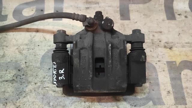 Суппорт тормозной задний правый 582300Z300 HYUNDAI