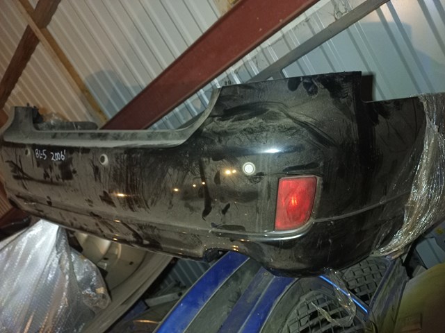 Бампер задний 57704AG250 SUBARU