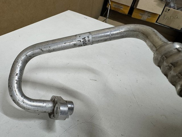 92490JG700 NISSAN Шланг кондиционера, от компрессора к радиатору купить в Полтава