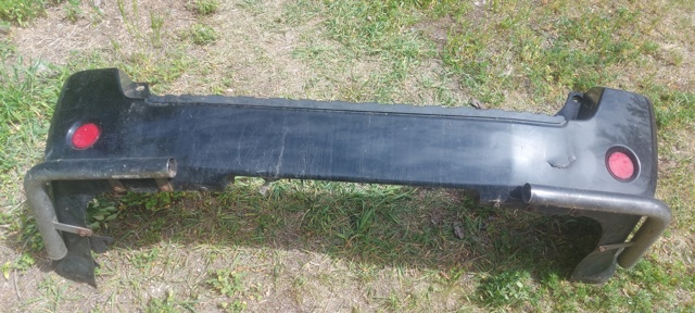 Задний бампер H5022EB320 NISSAN