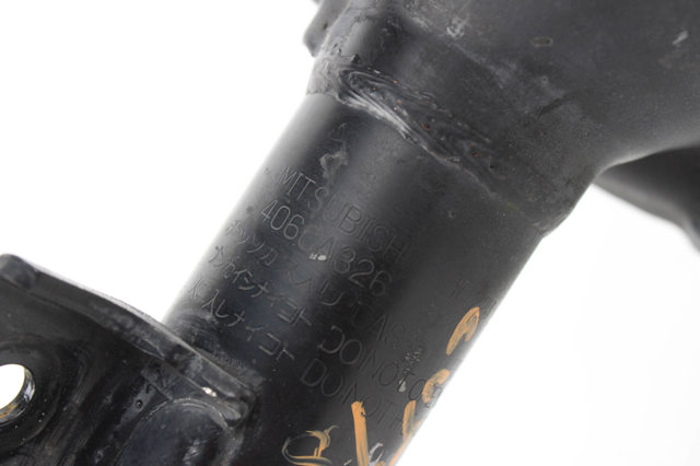 Амортизатор передний левый 4060A325 MITSUBISHI