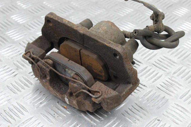 Суппорт тормозной, передний, правый 45002TL1G01 HONDA
