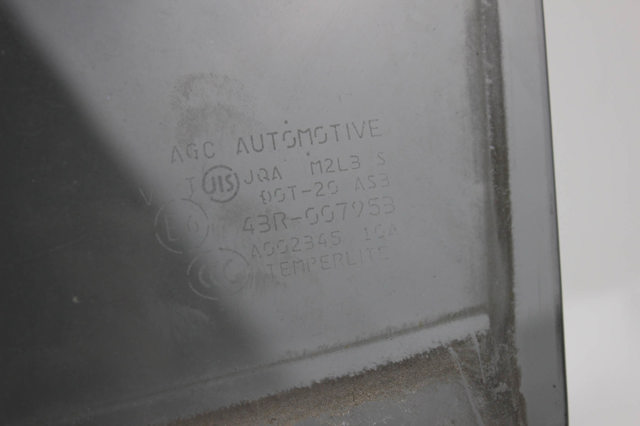 Стекло двери задней левой 5736A329 MITSUBISHI