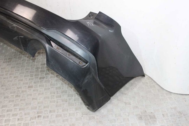 Задний бампер 57704SG012 SUBARU