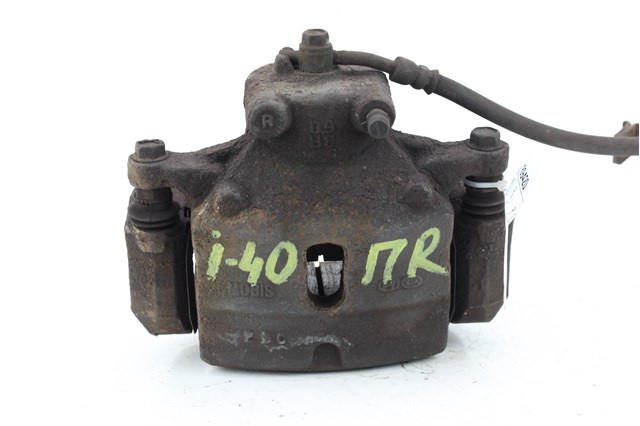 Суппорт тормозной, передний, правый 581303Z100 HYUNDAI