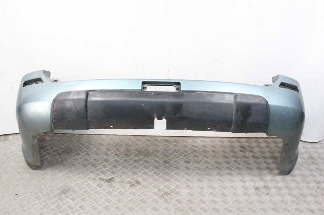 Задний бампер 850228H340 NISSAN
