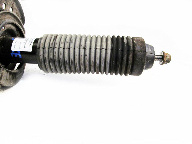 Амортизатор подвески передний левый E43031KC2A NISSAN