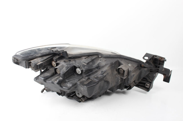Вставка фары левой GMG951041E MAZDA