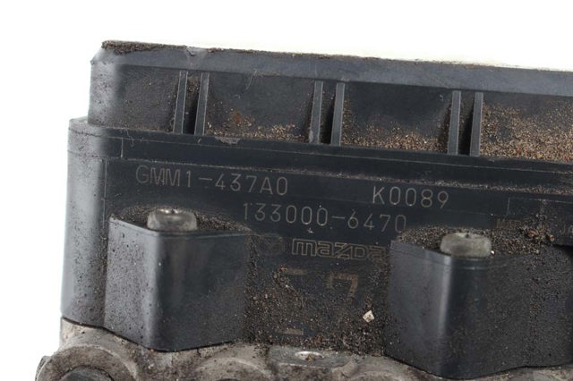 Блок ABS гидравлический GMM1437A0 MAZDA