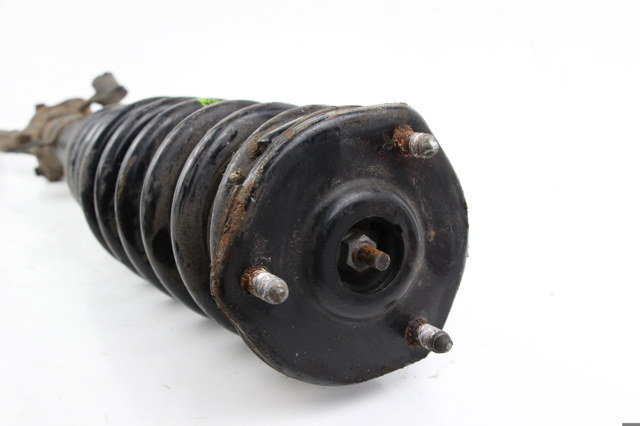 Амортизатор подвески передний левый GS1D34900G MAZDA