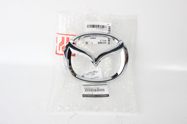 KA0G51730 MAZDA Эмблема решетки радиатора купить в Черкассы