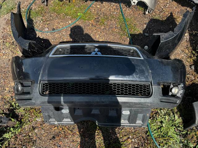 Бампер передний Mitsubishi Colt 7