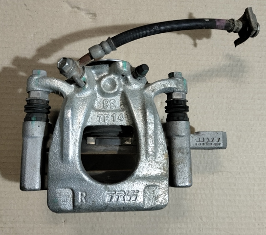 Задний правый суппорт 440014CA0A NISSAN