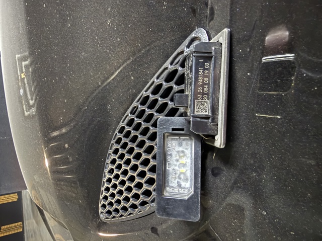 Фонарь подсветки заднего номера 63267193293 BMW