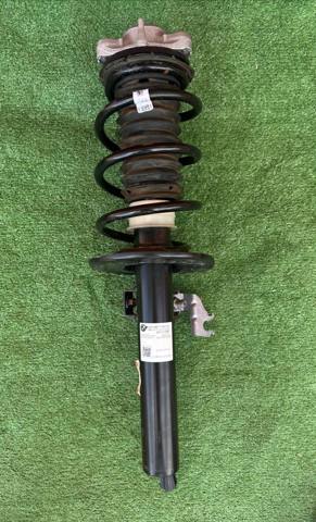 Амортизатор передней подвески левой 31316871781 BMW