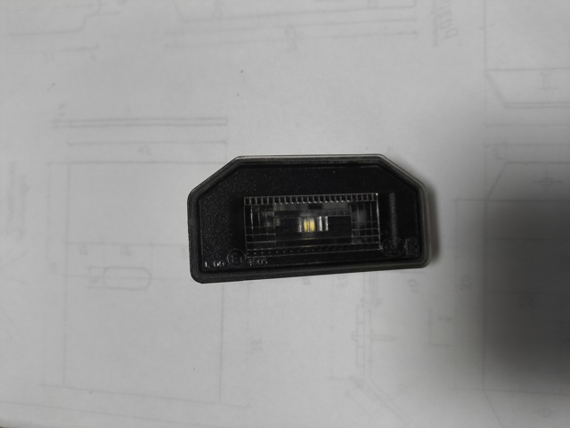 Фонарь освещения номерного знака 144973000B TESLA