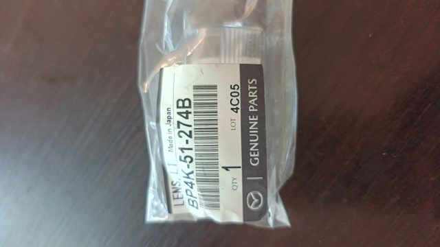 Корпус фонаря подсветки номерного знака BP4K51274B MAZDA