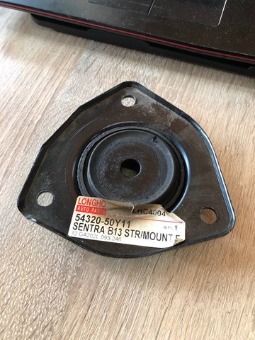 Подушка амортизатора переднего Nissan Almera I