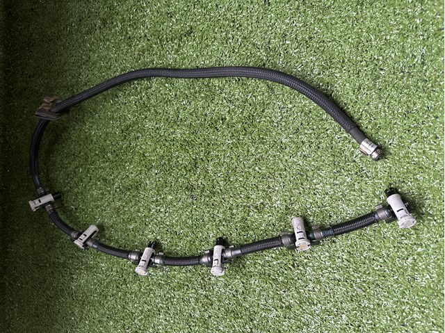 Обратная топливная трубка от форсунок 7799993 BMW