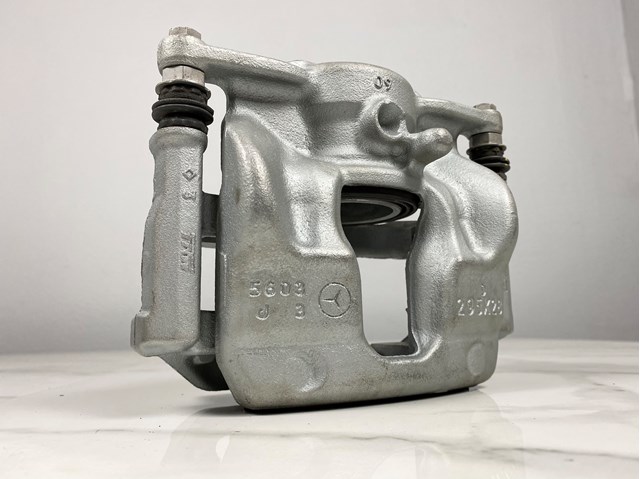 Суппорт тормозной, передний, левый A0004213981 MERCEDES