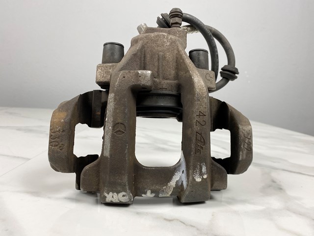 Суппорт тормозной левый задний A0044203983 MERCEDES
