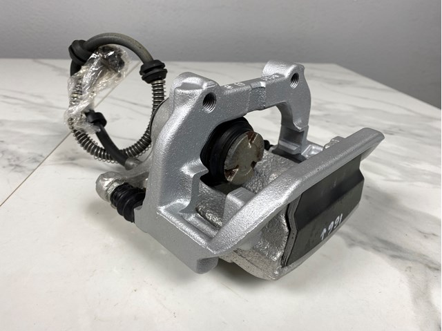 A1664230581 Суппорт тормозной задний левый купить Ужгород