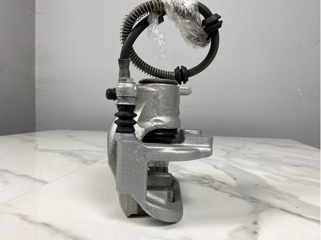 A1664230581 Суппорт тормозной задний левый купить Одесса