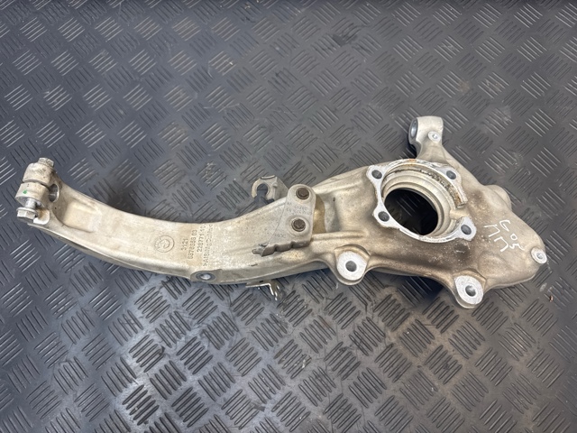 Цапфа поворотная правая 31216876656 BMW