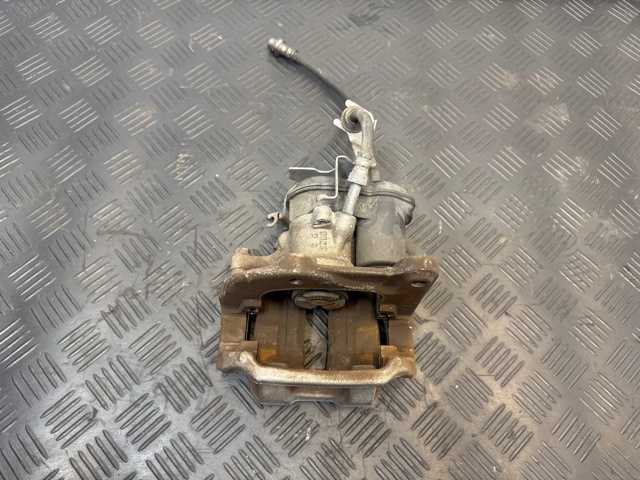 34216891767 BMW Суппорт тормозной задний левый купить в Харьков