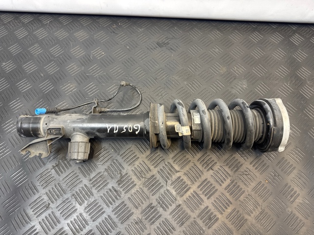Амортизатор передней подвески левой 37106869019 BMW