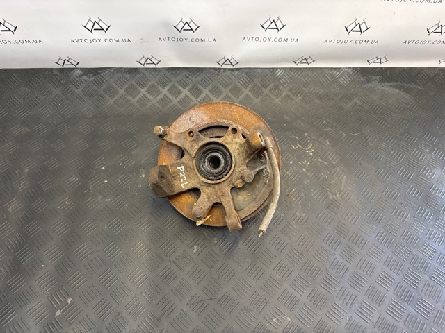 40015VK355 NISSAN Цапфа передняя левая купить в Чернигов
