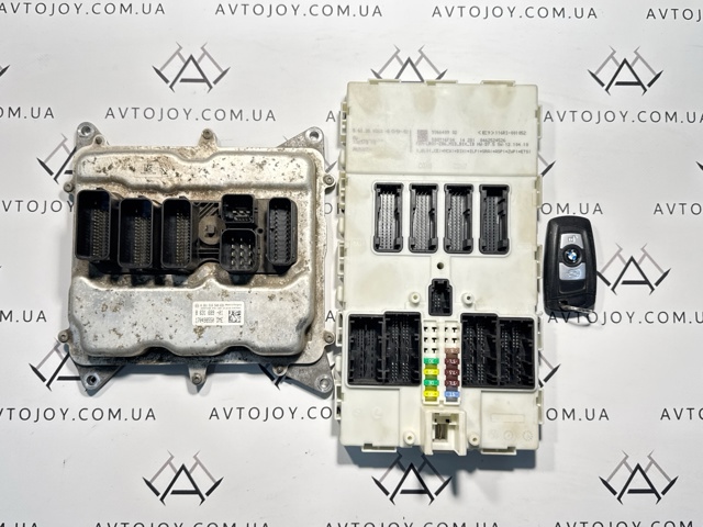 Модуль управления двигателем 8631689 BMW