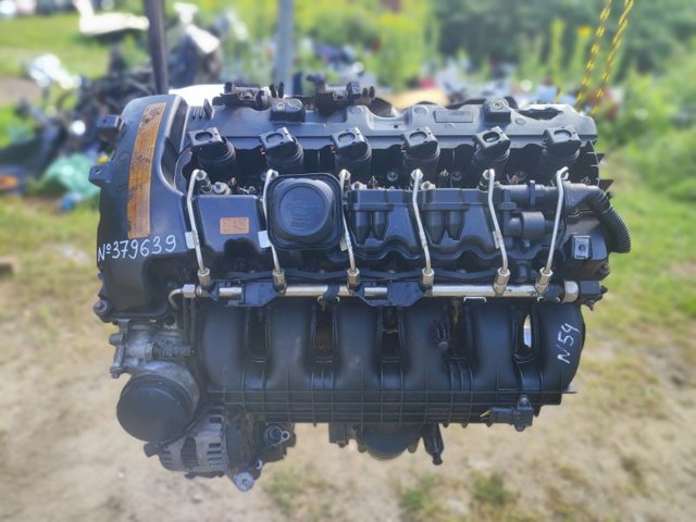 Двигатель голый 11000415043 BMW