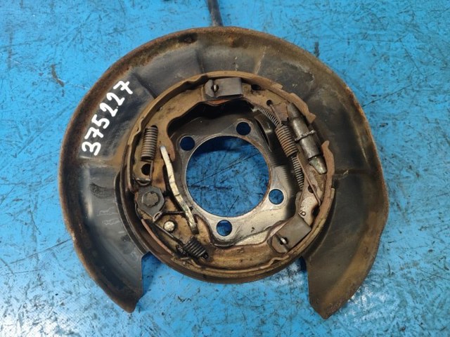 Пыльник тормозного диска заднего правый 4650342040 TOYOTA
