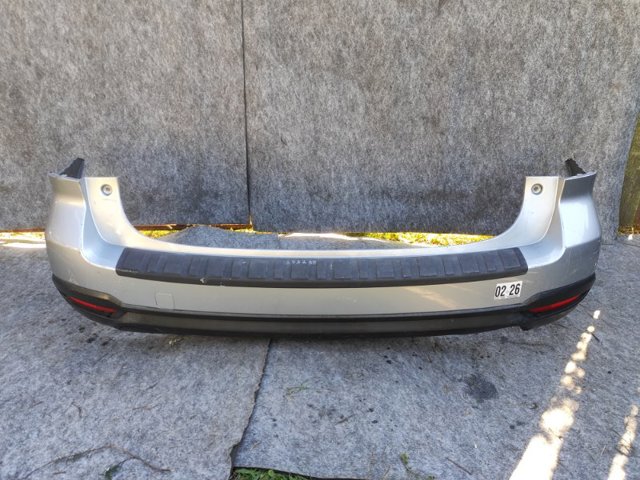 Бампер задний 57704SG012 SUBARU