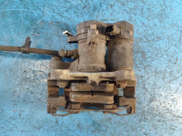 Суппорт тормозной задний правый DG9Z2552C FORD