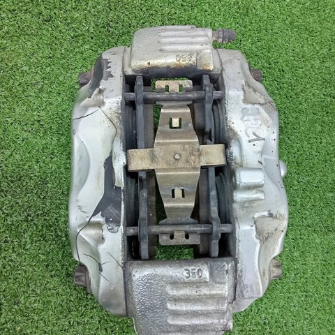Суппорт тормозной, передний, левый A0034205383 MERCEDES