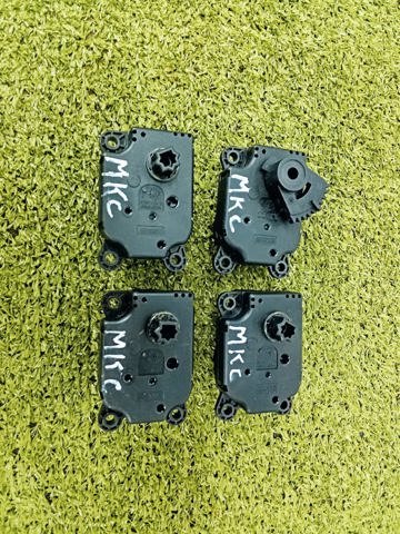 AV6N19E616BA Привод заслонки печки купить Украина