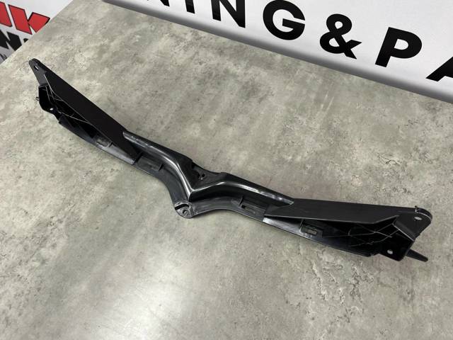 106247200F TESLA Кронштейн решетки радиатора купить в Хмельницкий