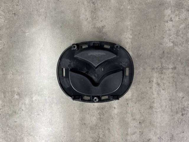 GHP950716 MAZDA Эмблема решетки радиатора купить в Украина