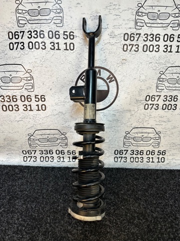 Передний правый амортизатор 31316866591 BMW