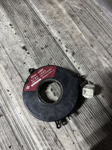 Датчик угла поворота руля 47945AS500 NISSAN