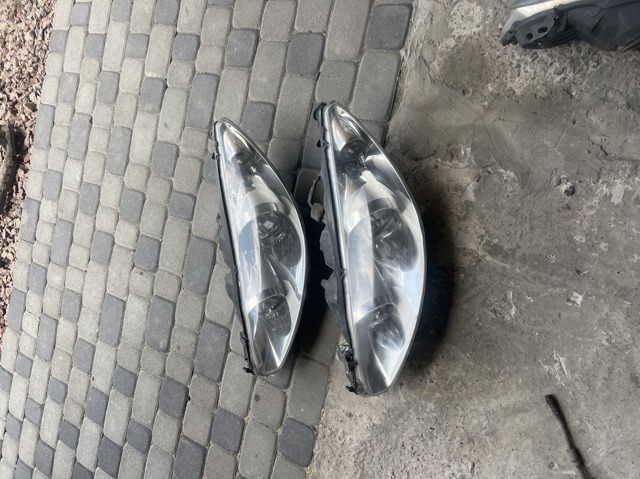 Вставка фары левой 9674039880 PEUGEOT