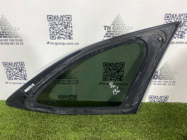 Стекло багажника, левое 65209AN03A SUBARU