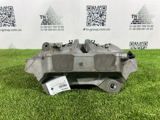 80A615107A VAG Суппорт тормозной передний левый купить в Ровно
